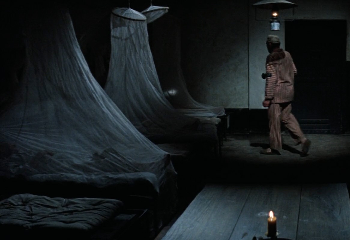 The only true prion escape sequence of the film involving beating a bunch of guys unconscious and scaling a wall. Yeah.